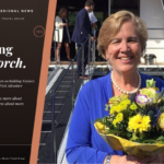 Jackie Friedman holding a bouquet of flowers during her Nexion Travel Group leadership journey, featured in the “Passing the Torch” interview.